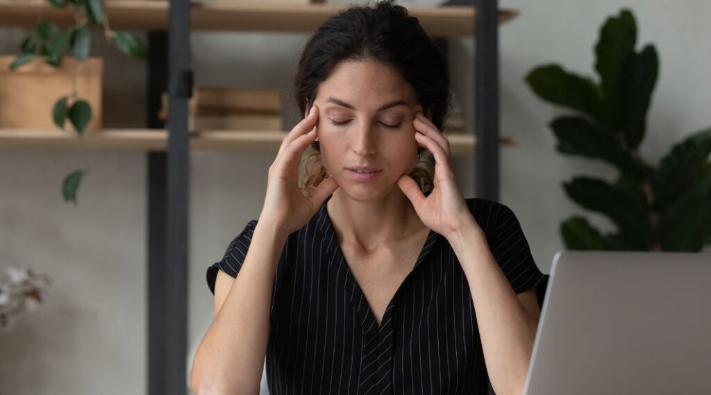 Stressed adult child managing downsizing