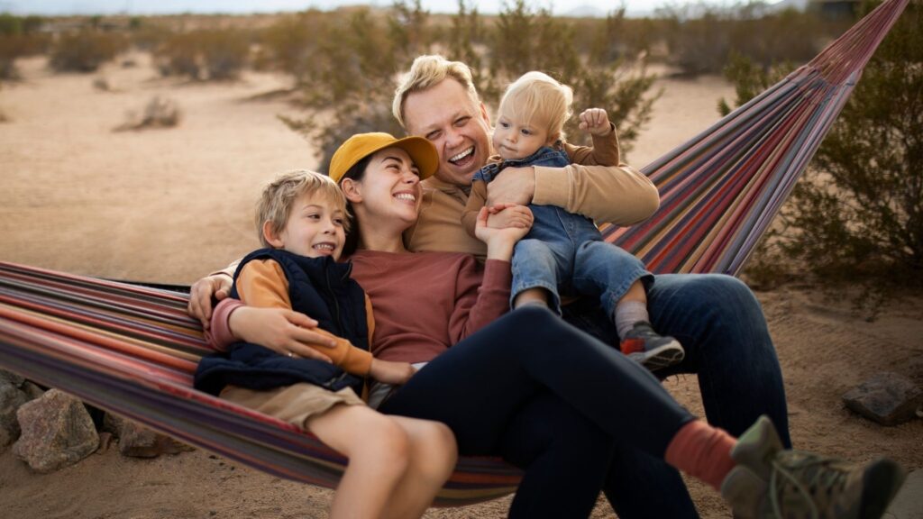 A young family bonding outdoors after moving to Australia, finding moments of joy while navigating homesickness and settling into a new life